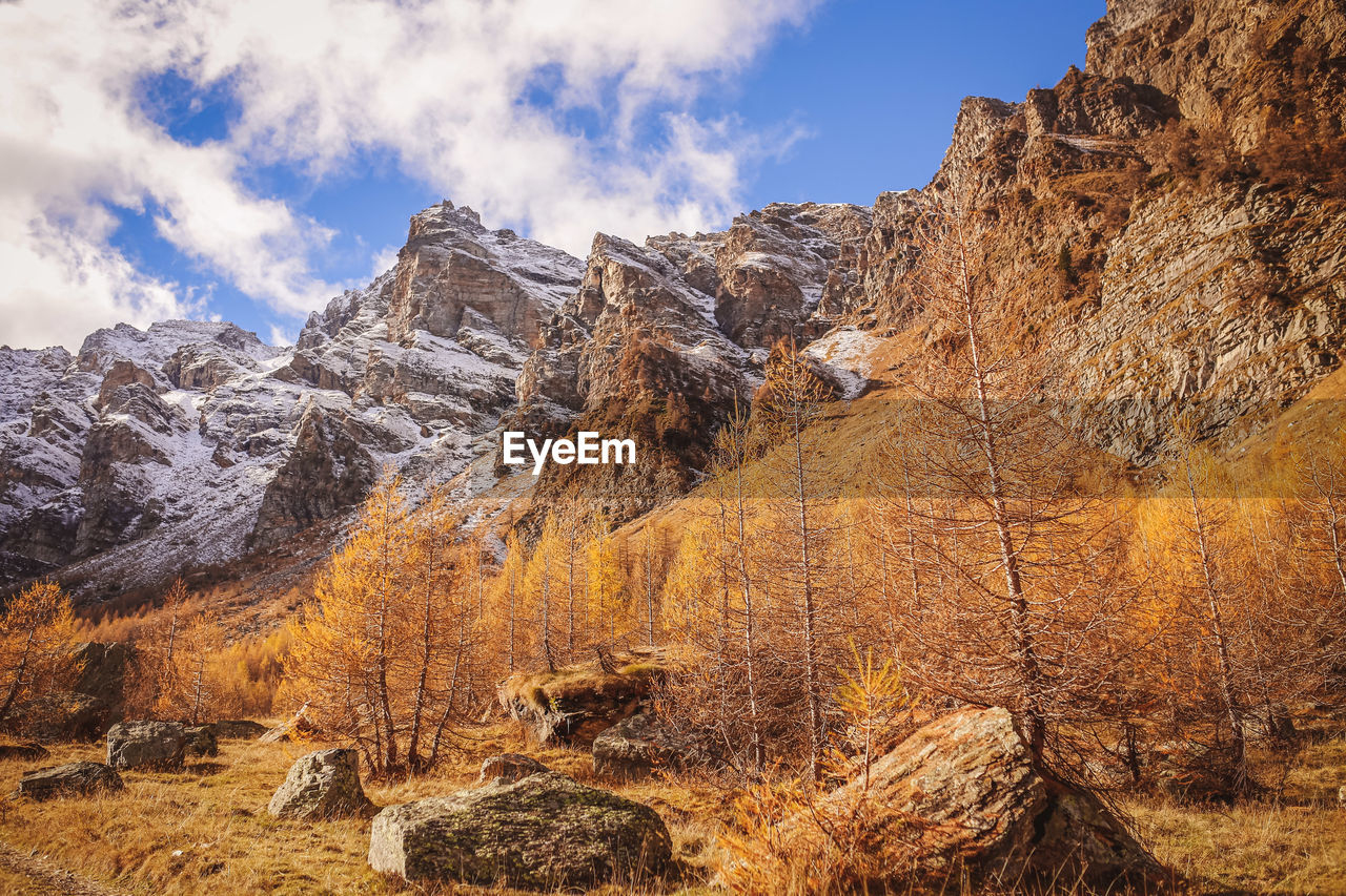 Panoramic view of rocky mountains against sky