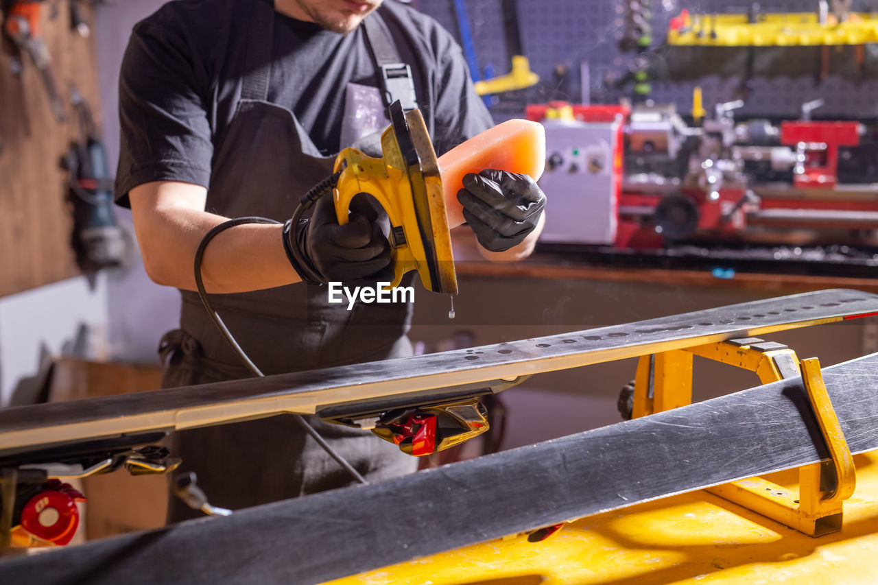 Man working on metal structure