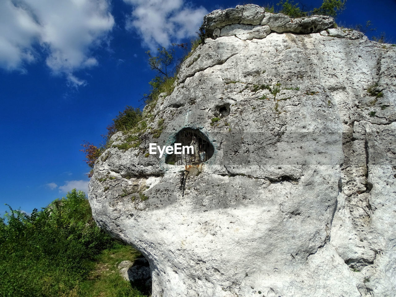 LOW ANGLE VIEW OF ROCK FORMATION
