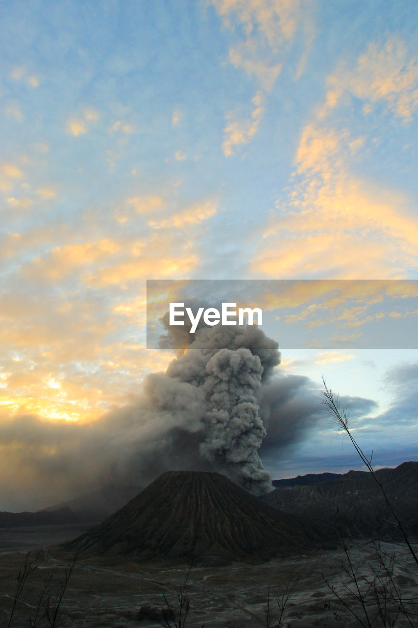 smoke, volcano, geology, sky, environment, cloud, erupting, mountain, landscape, beauty in nature, nature, power in nature, land, active volcano, non-urban scene, scenics - nature, no people, physical geography, volcanic landscape, ash, volcanic crater, steam, burnt, outdoors, heat, warning sign, accidents and disasters, sign, sunlight, travel destinations, dawn, communication