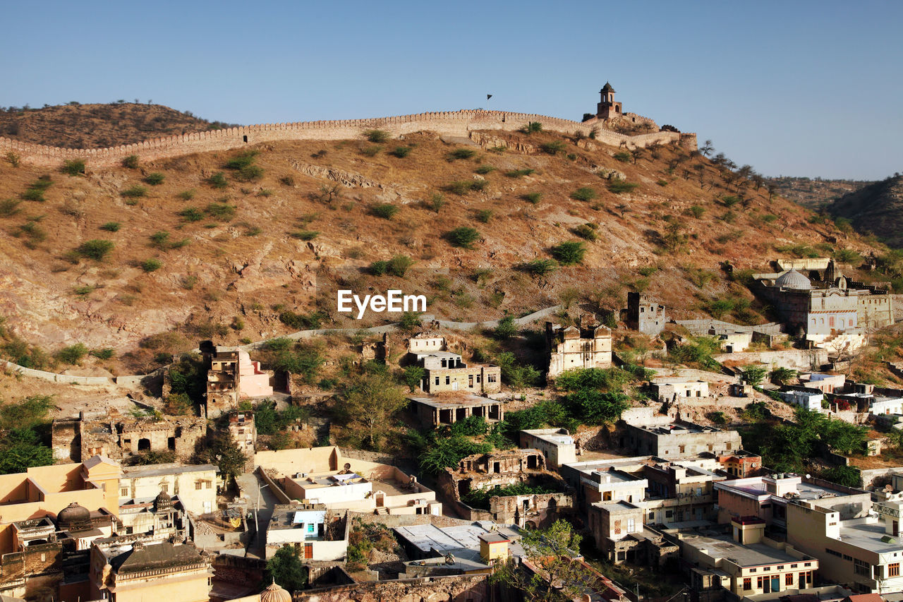 High angle view of residential district by mountain and amer fort