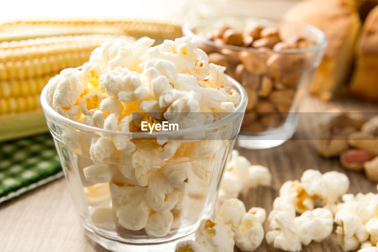 Close-up of popcorns in container on table