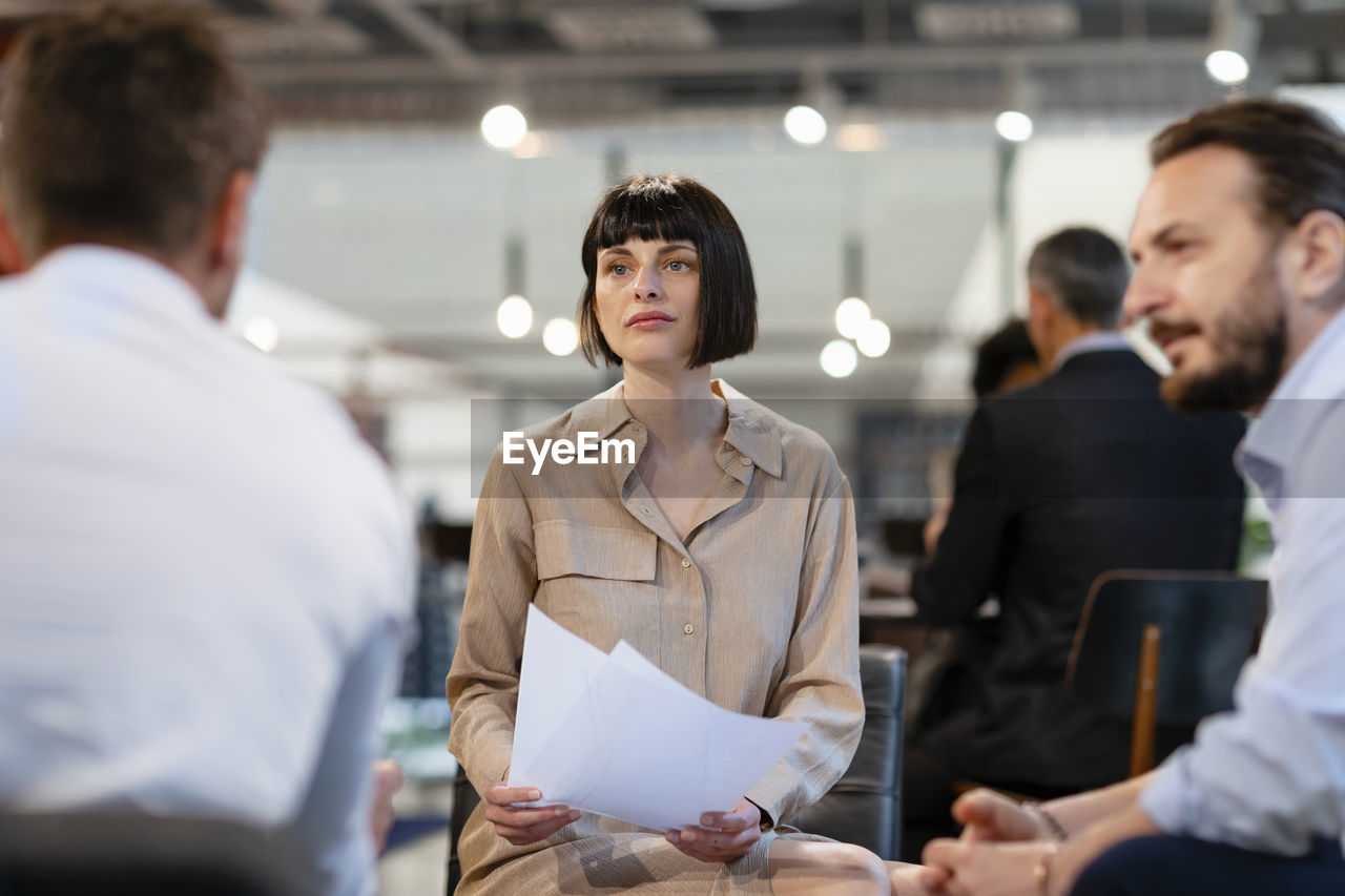 Business colleagues planning strategy in meeting at office