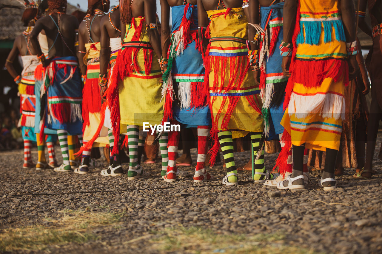 Turkana men wearing colourful traditional clothes