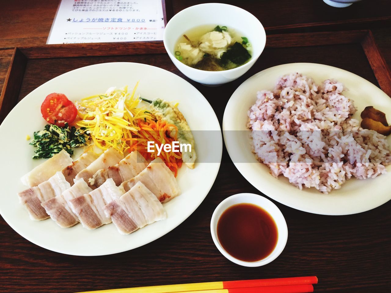 High angle view of food served in plates on table