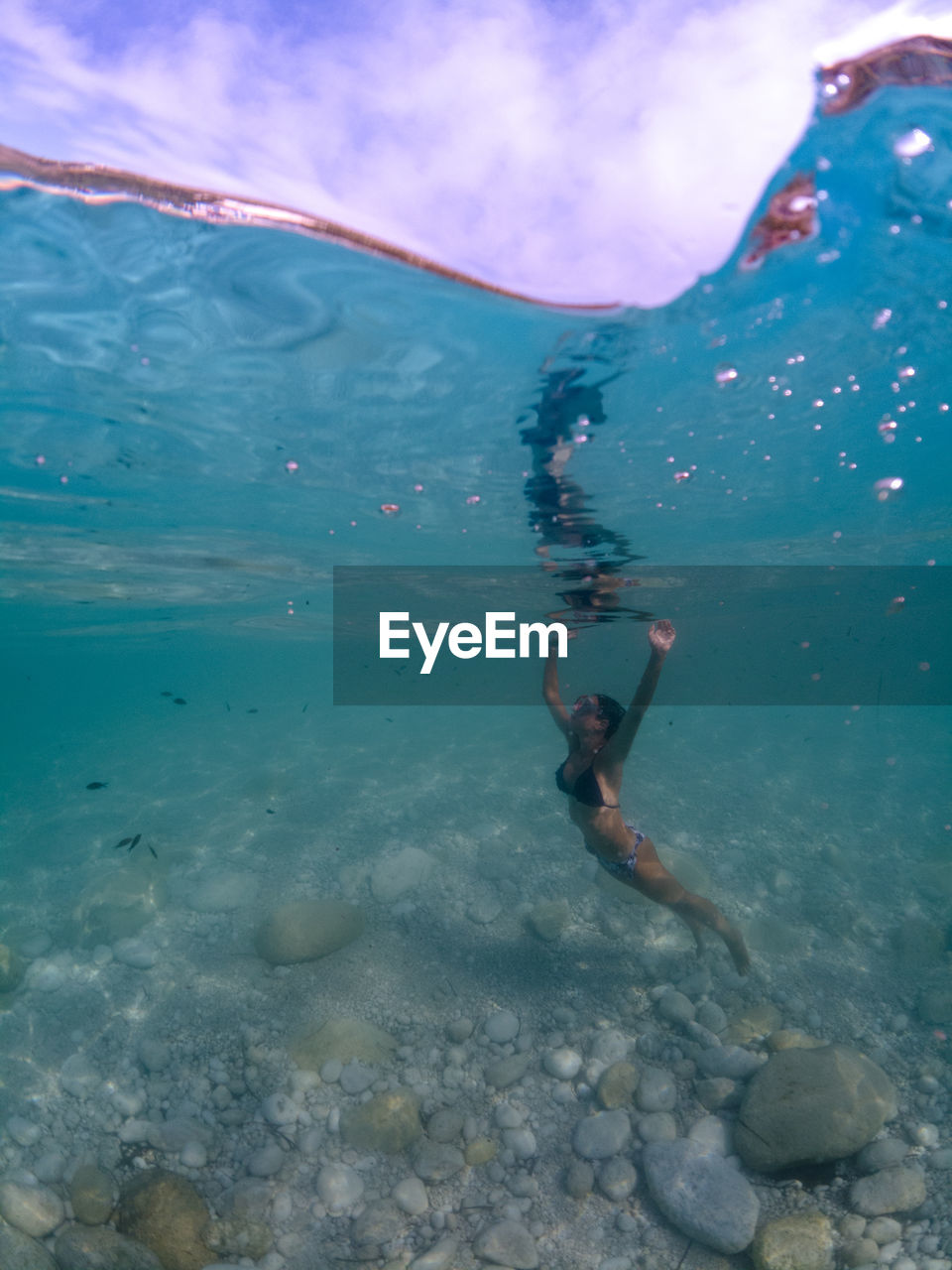 Woman swimming in ionian sea