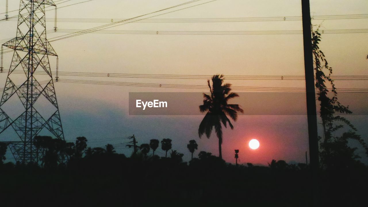 LOW ANGLE VIEW OF POWER LINES AGAINST SKY