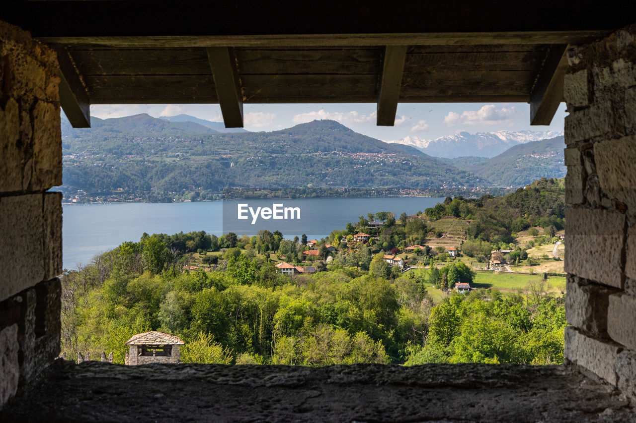 Scenic view of the lake maggiore seen from the tower of the rocca di angera, italy