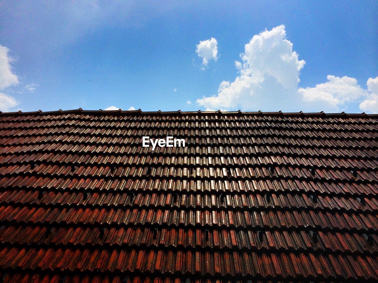 Low angle view of roof against sky