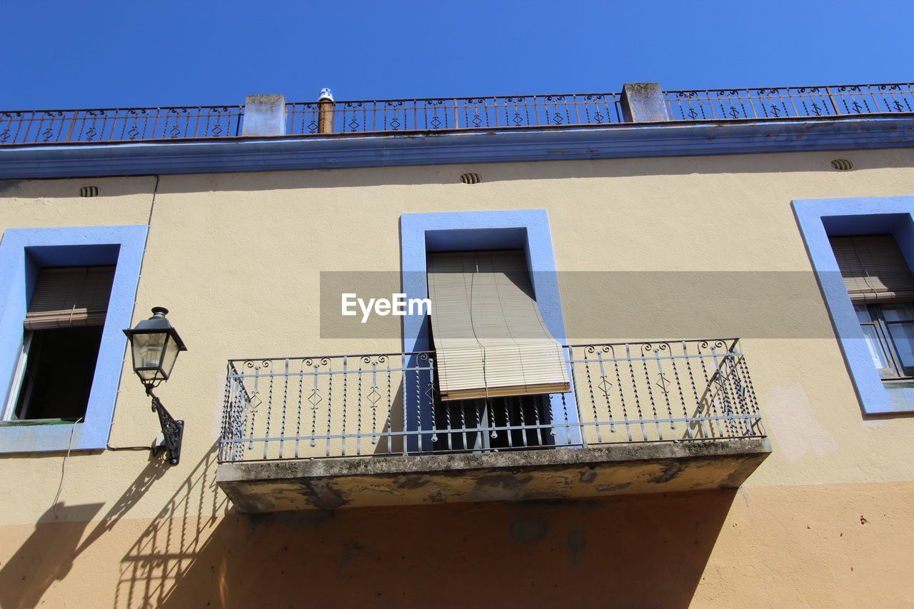 Low angle view of residential building against sky