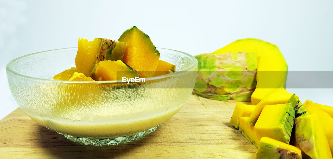 Close-up of fruits in bowl on table