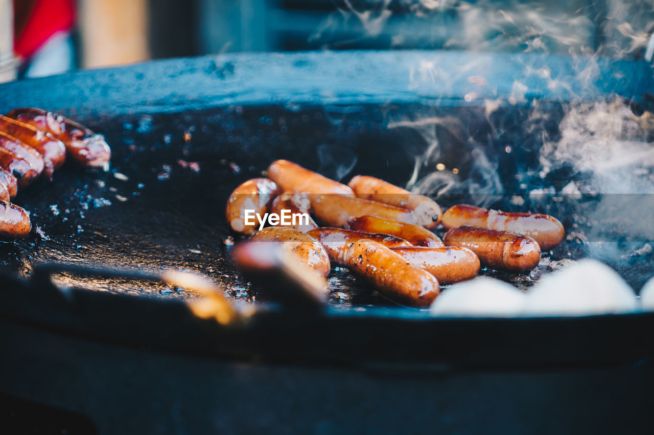 Close-up of sausages on cooking pan