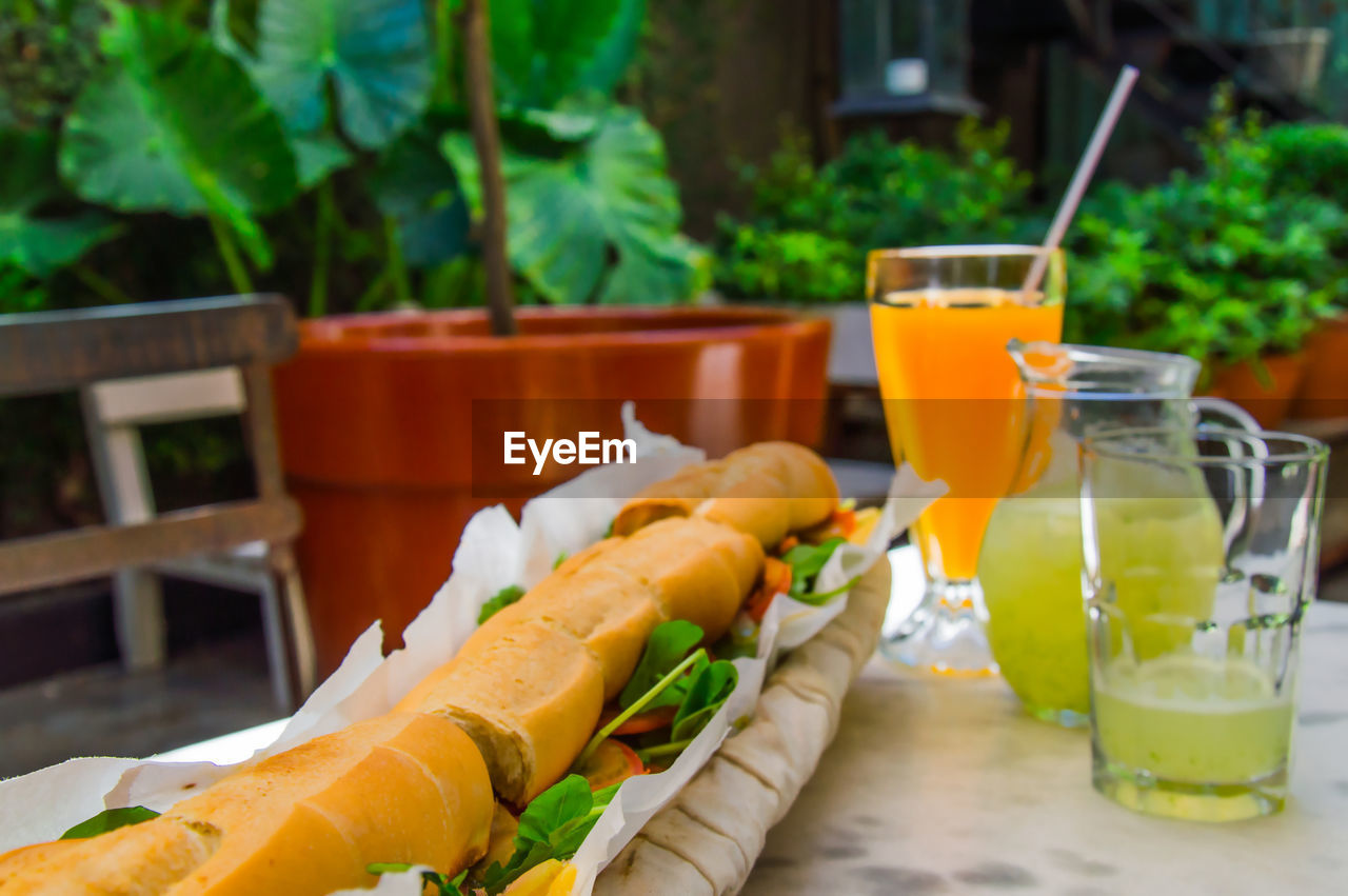 Close-up of  big sandwich on table