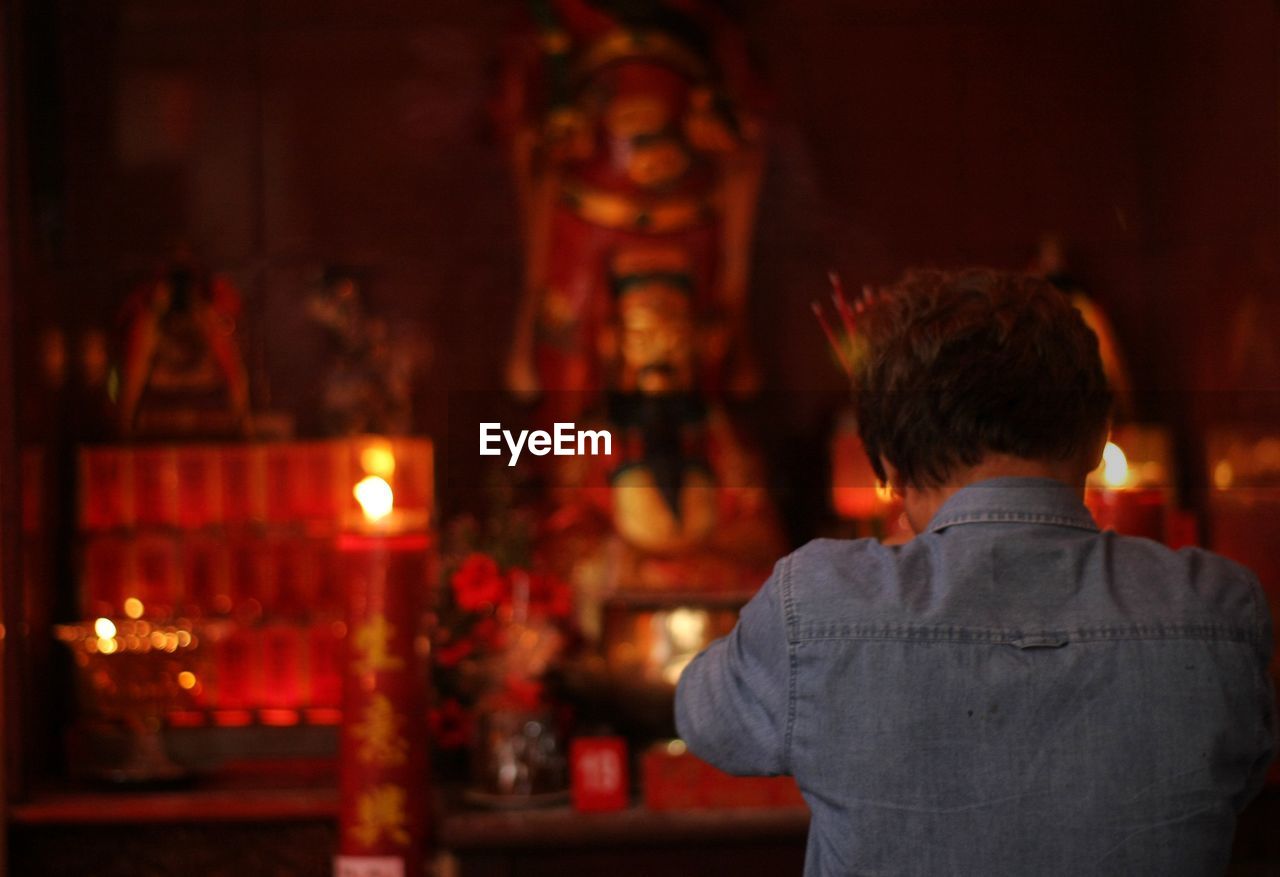 People praying at vihara dharma ramsi, bandung during chinese new year 2570.