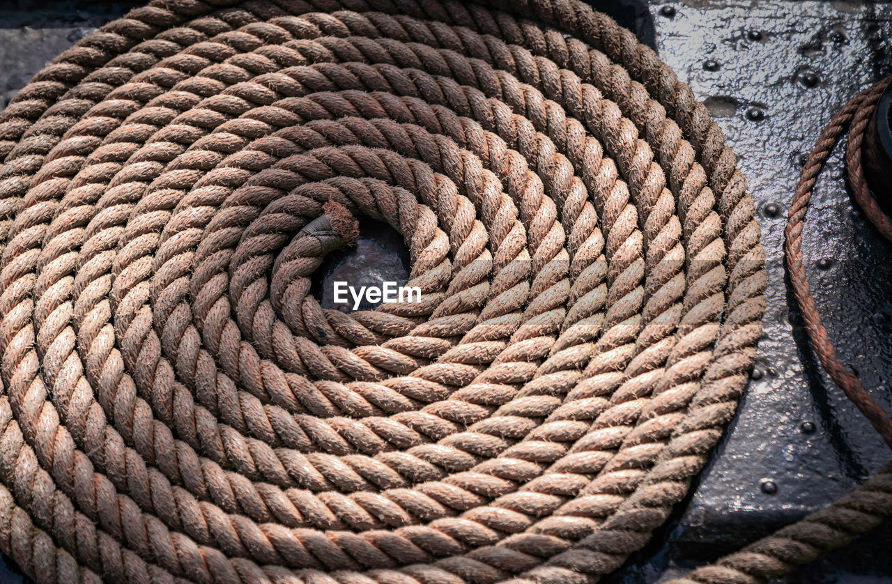 High angle view of rope on metal