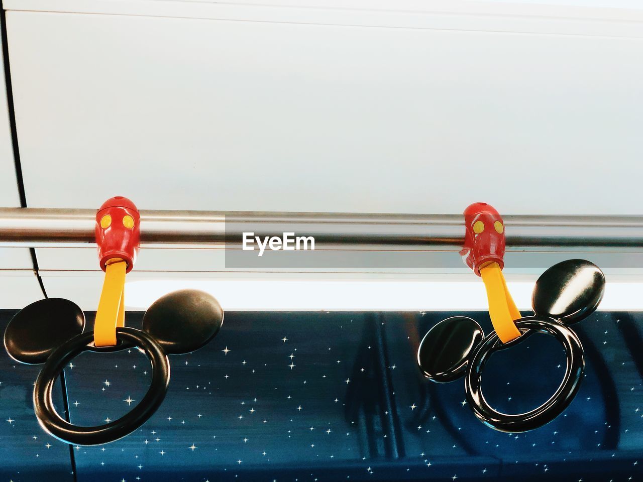 Close-up of hand holder on train