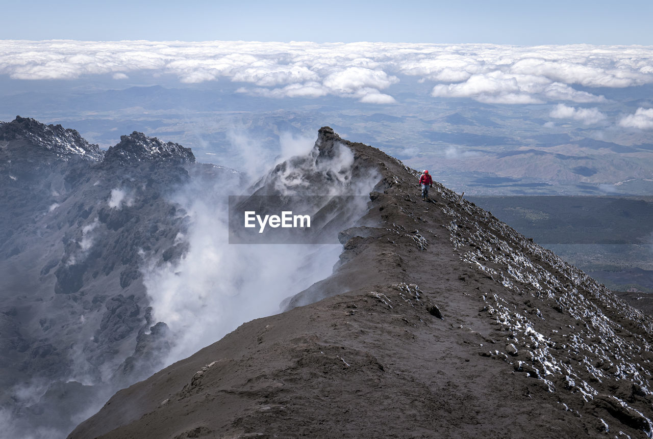 SCENIC VIEW OF MOUNTAIN AGAINST SKY