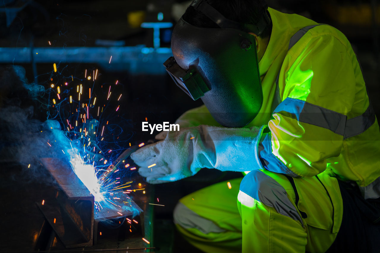 A male worker chia steel in an industrial factory. concept industry.