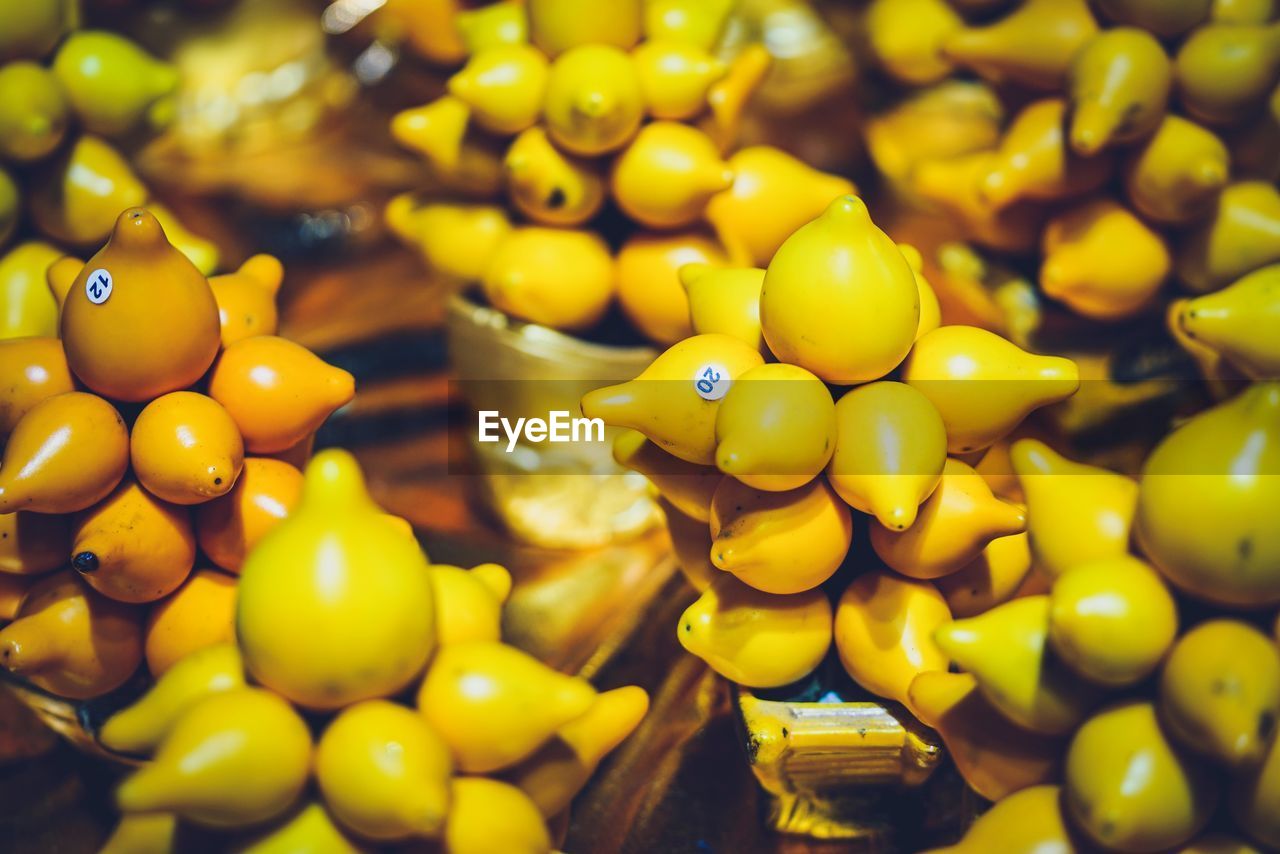 Close-up of yellow fruits for sale at market stall