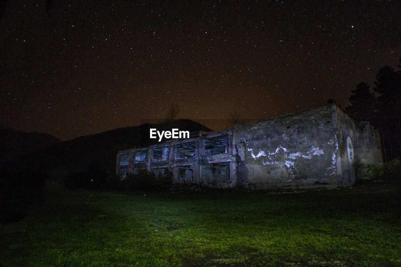 ABANDONED BUILDING AGAINST SKY