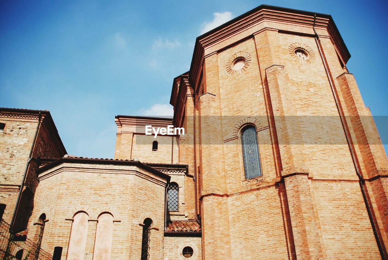 LOW ANGLE VIEW OF BELL TOWER AT THE CHURCH
