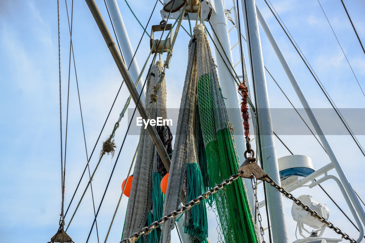 Low angle view of sailboat against sky