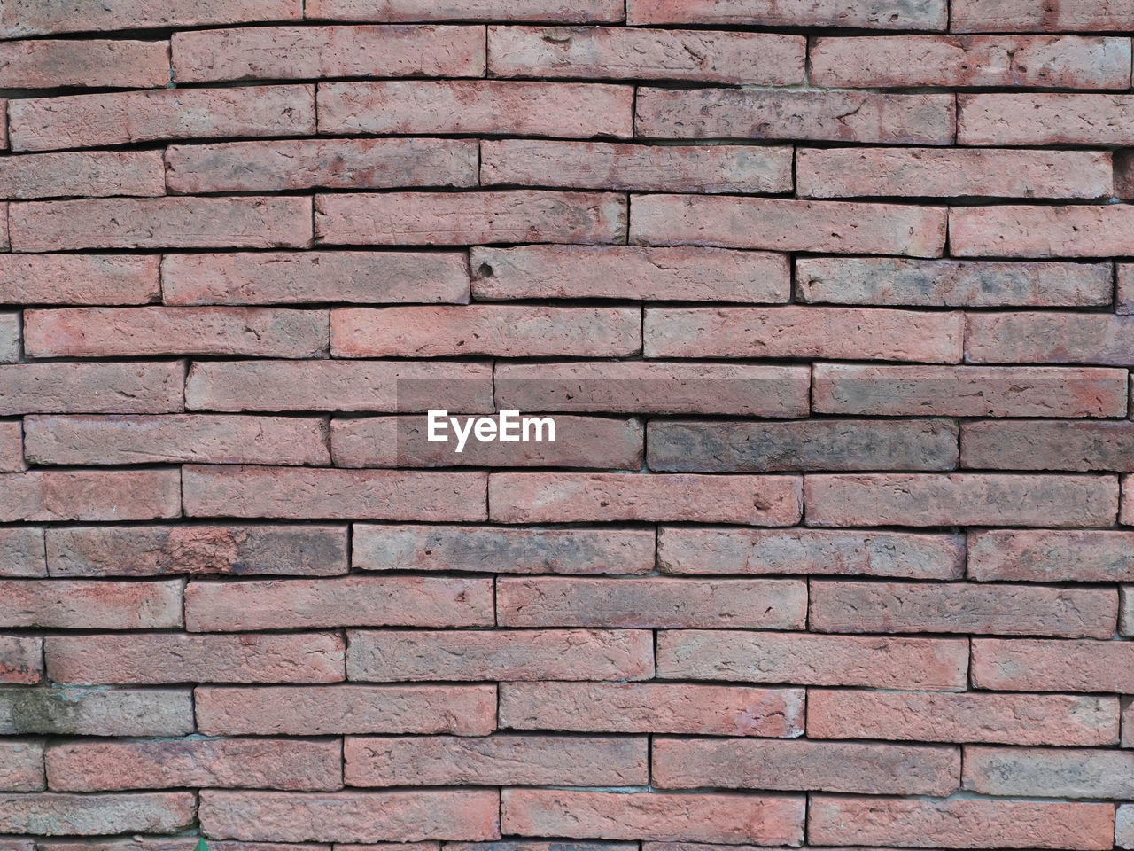 FULL FRAME SHOT OF RED BRICK WALL