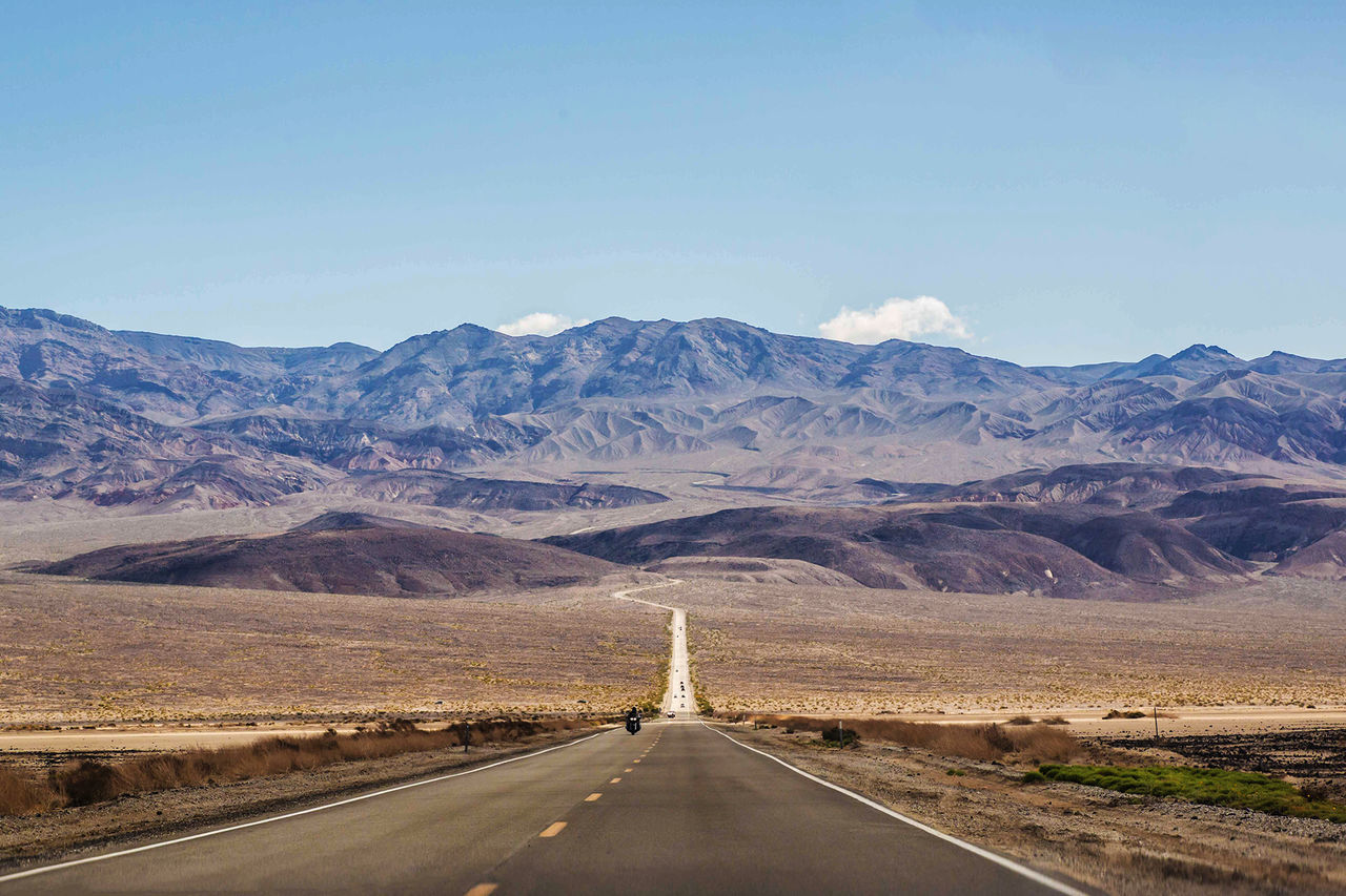 Road leading towards mountains