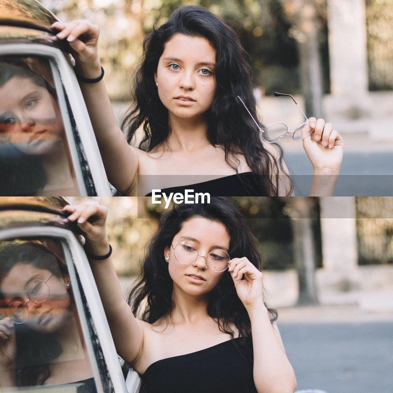 PORTRAIT OF A BEAUTIFUL YOUNG WOMAN IN A CAR