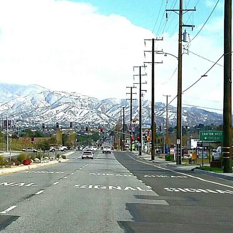 ROAD LEADING TOWARDS MOUNTAINS