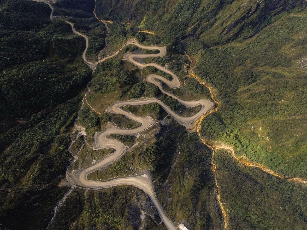 High angle view of winding road on landscape