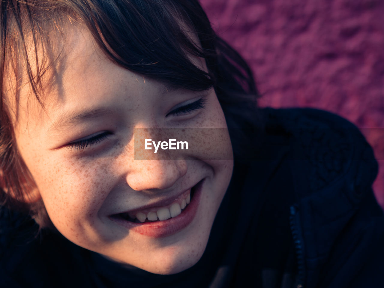 Close-up of boy smiling