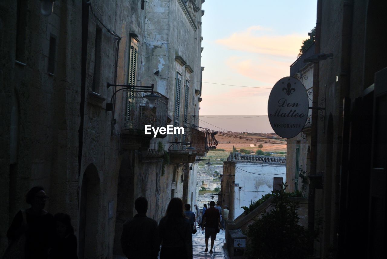 PANORAMIC SHOT OF SILHOUETTE CITYSCAPE AGAINST SKY