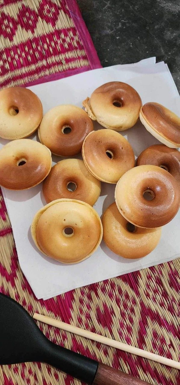 food and drink, food, dessert, baked, sweet food, doughnut, high angle view, freshness, no people, sweet, still life, snack, table, indoors