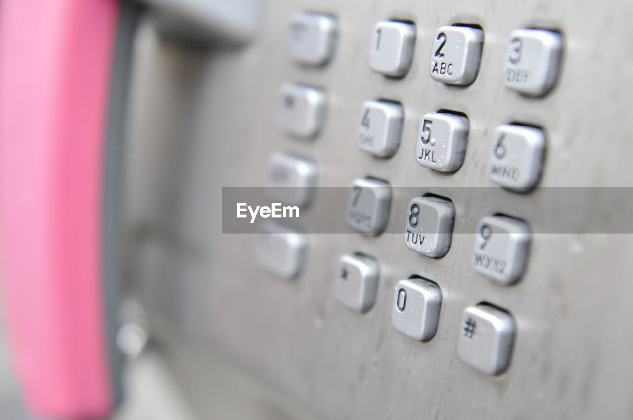 Close-up of pay phone