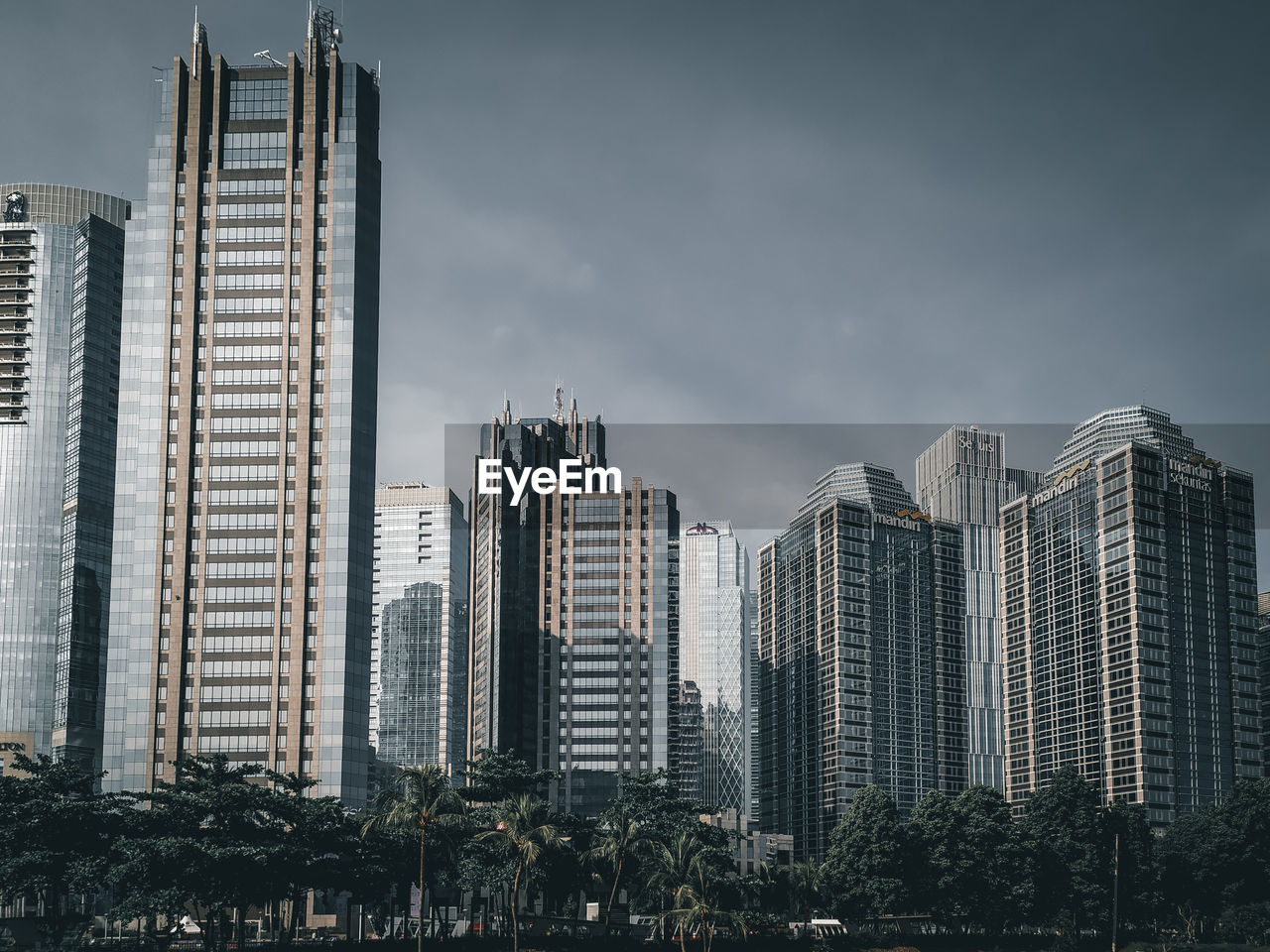 Modern buildings against sky in city