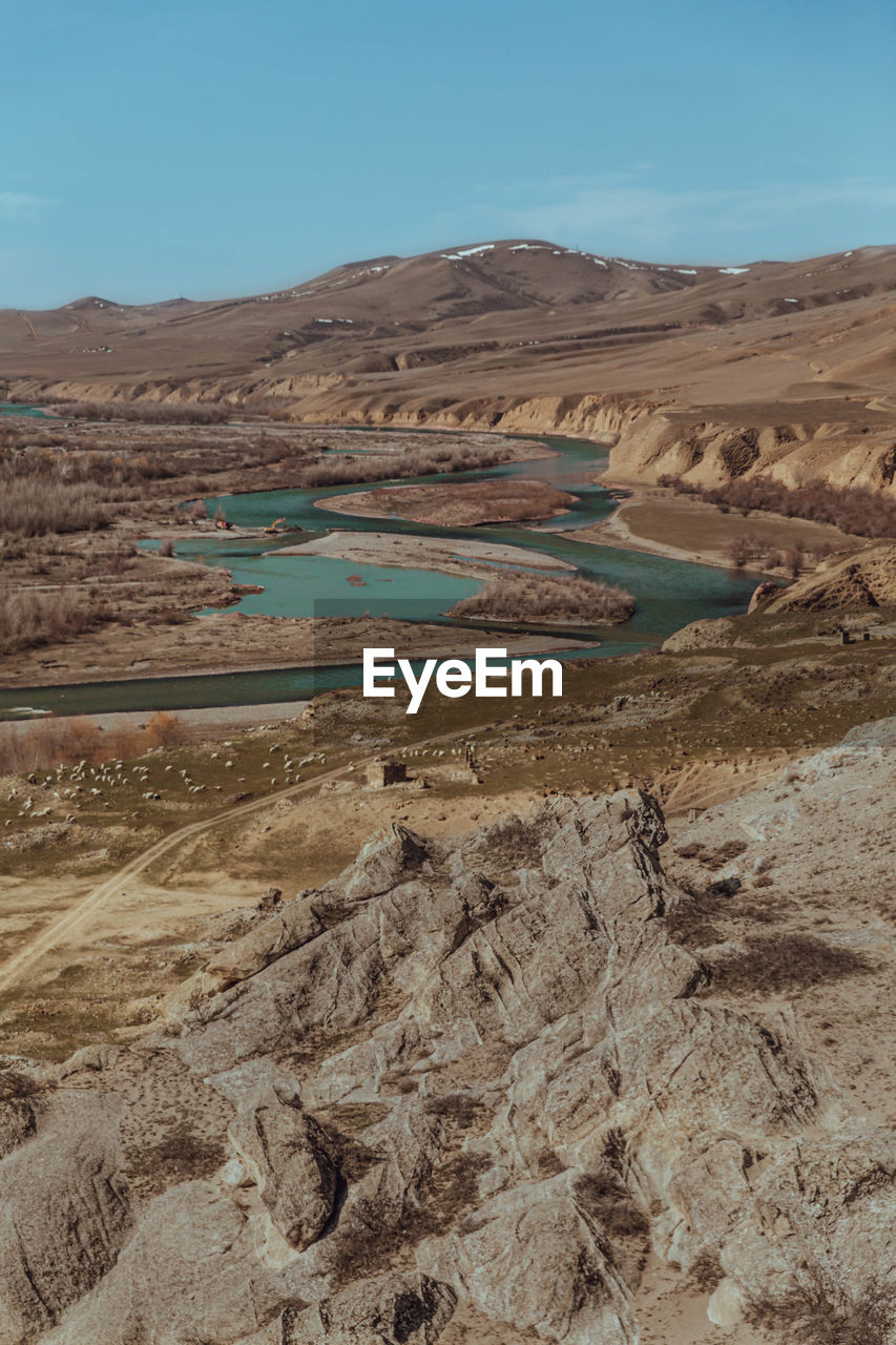 Scenic view of desert against sky