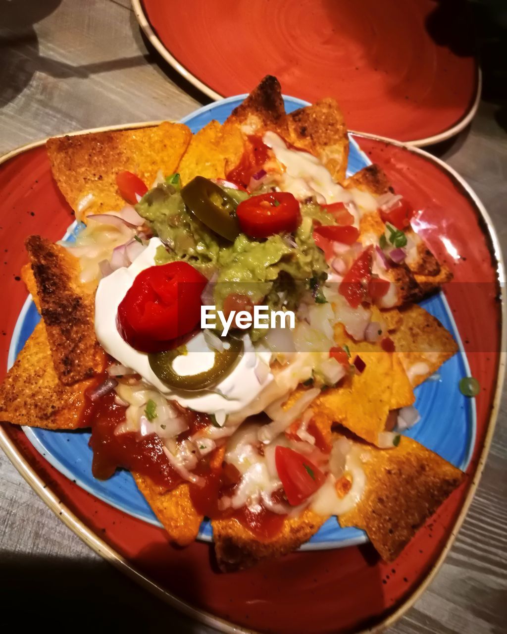 CLOSE-UP OF SERVED FOOD ON TABLE