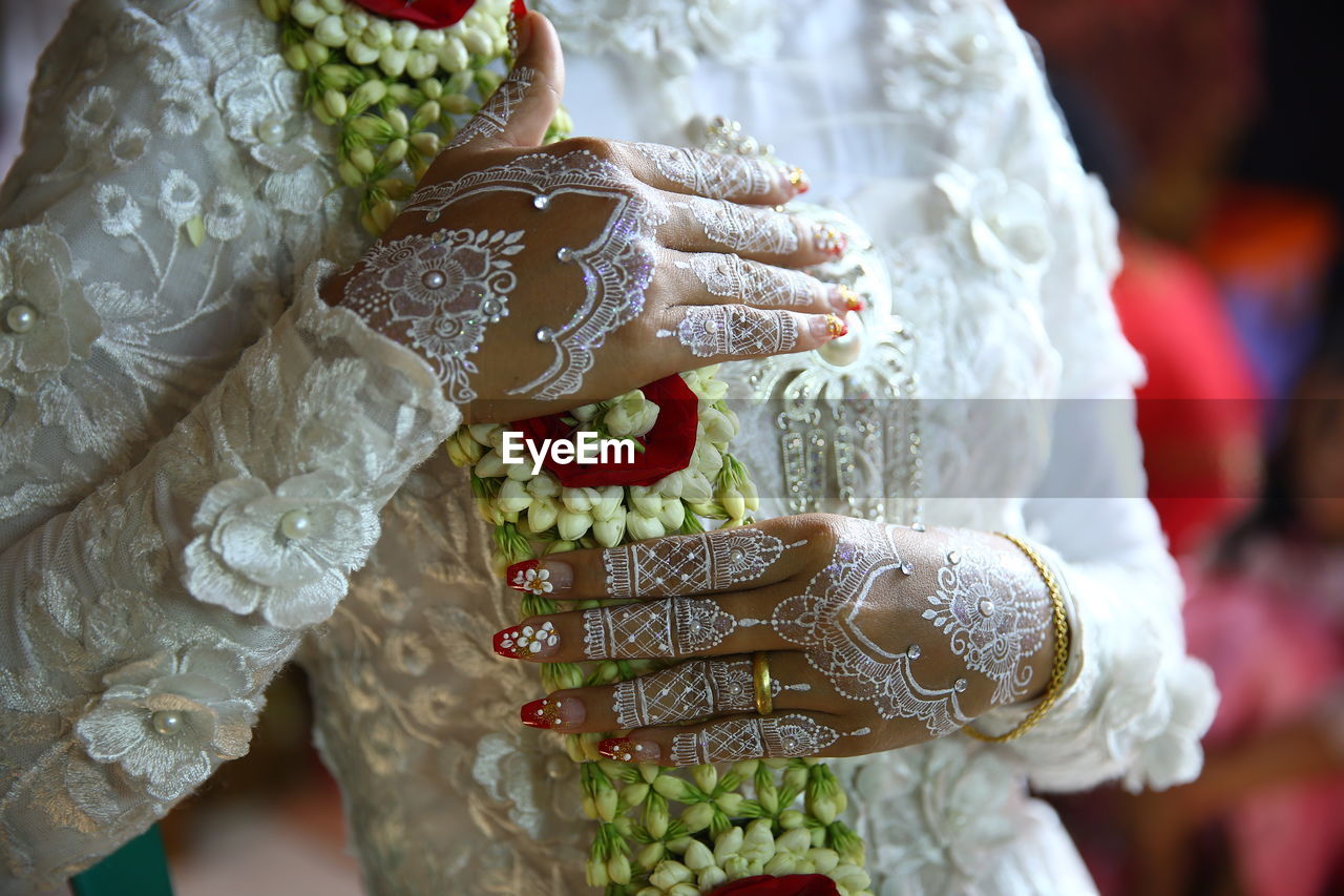 Henna is a hand painting worn by the bride when she is getting married