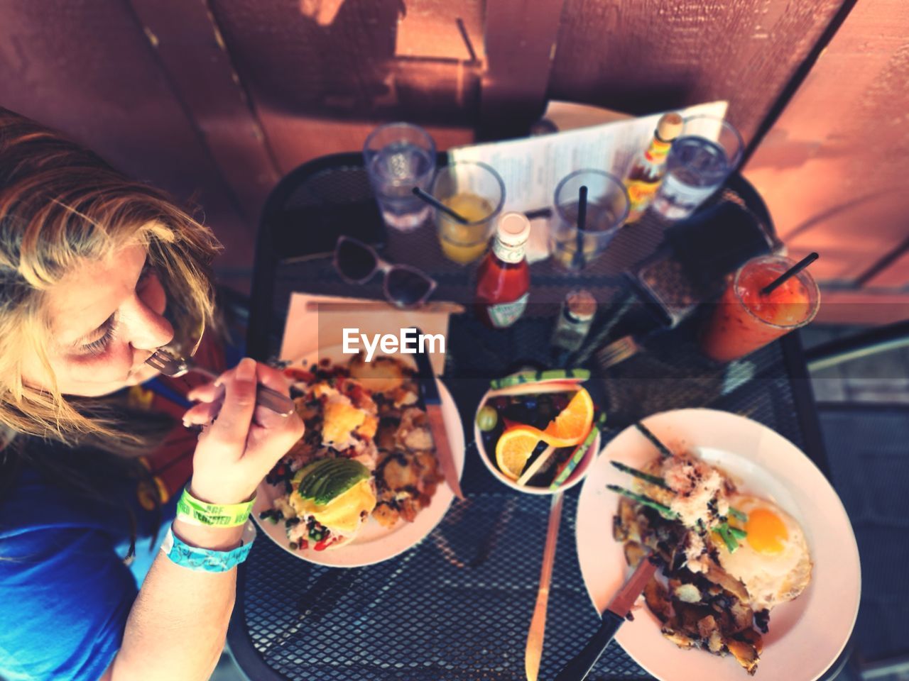 High angle view of woman having breakfast