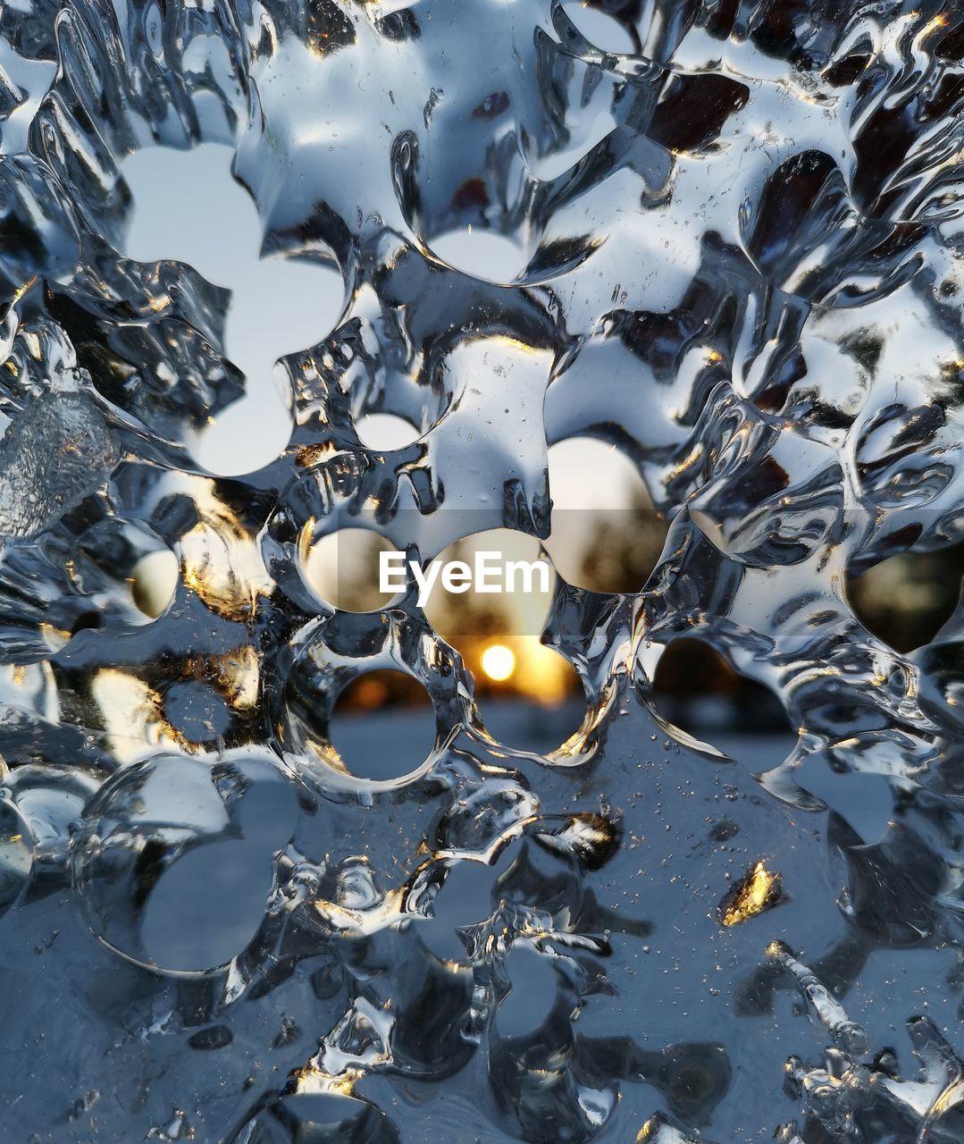 Sky seen through holes in ice