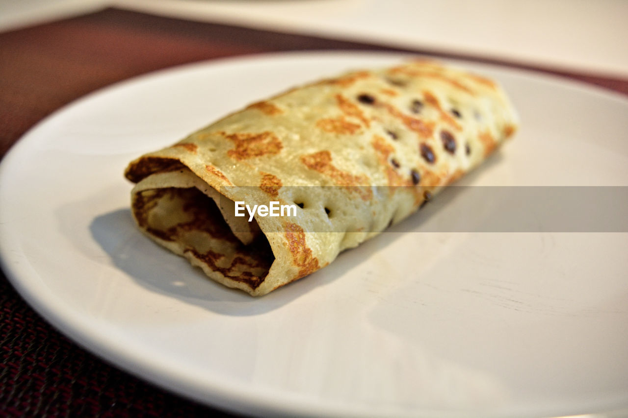 food, food and drink, plate, dish, cuisine, taquito, meal, breakfast, burrito, produce, close-up, freshness, no people, dessert, indoors, baked, fast food, healthy eating, selective focus, egg roll, wellbeing