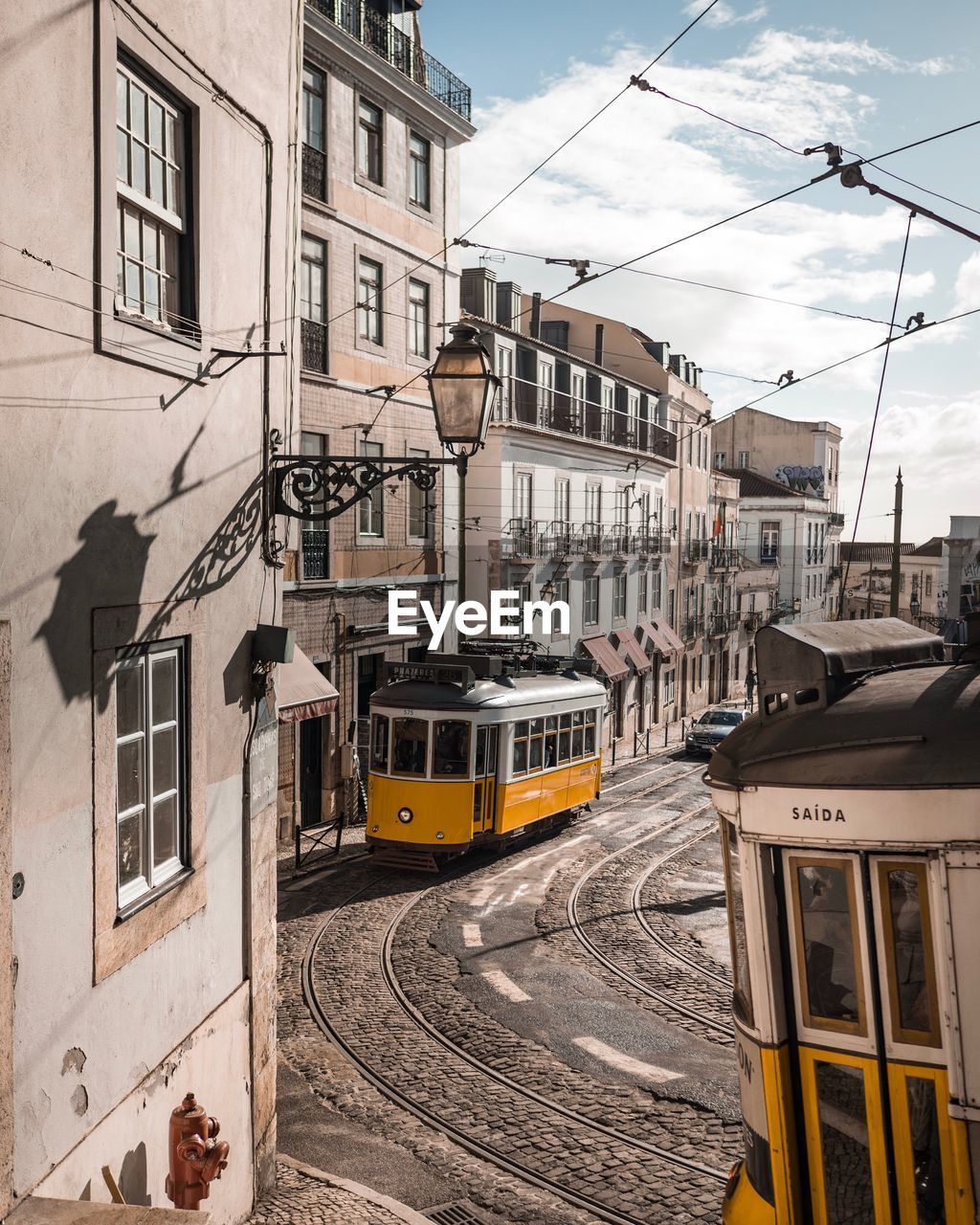 Cable car on street in city