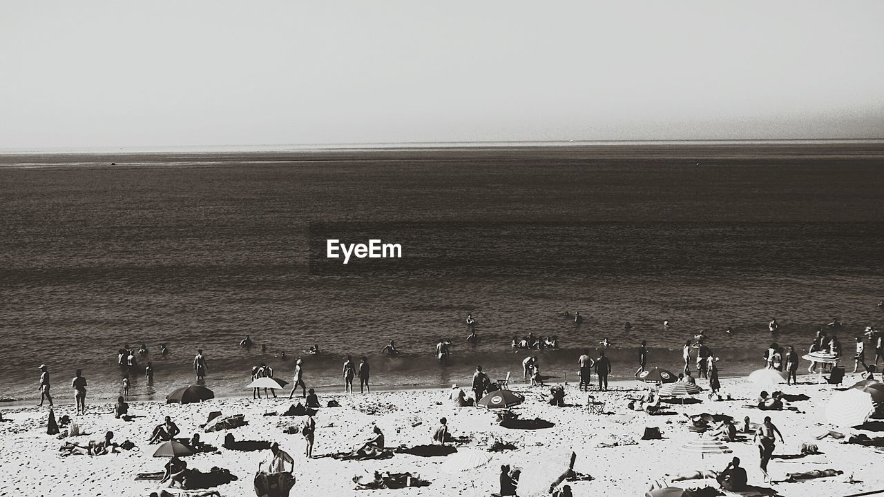 TOURISTS ON BEACH