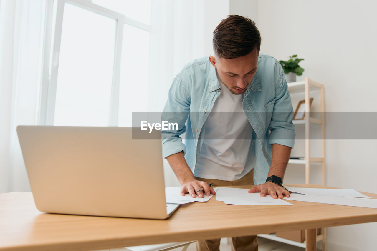 Businesswoman working at desk in office