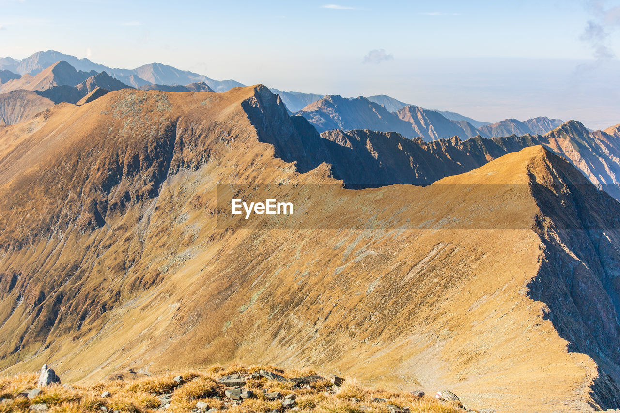 Aerial view of mountains against sky