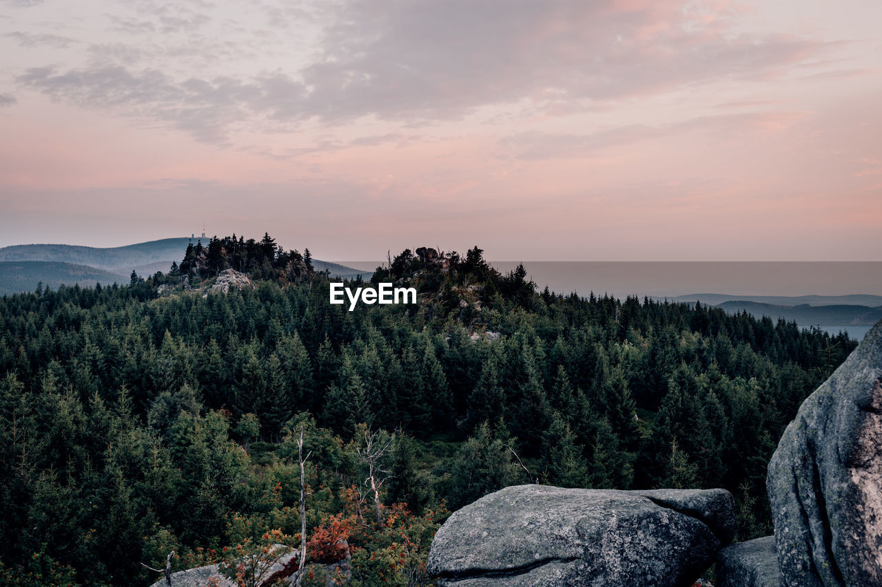 Scenic view of landscape against sky during sunset