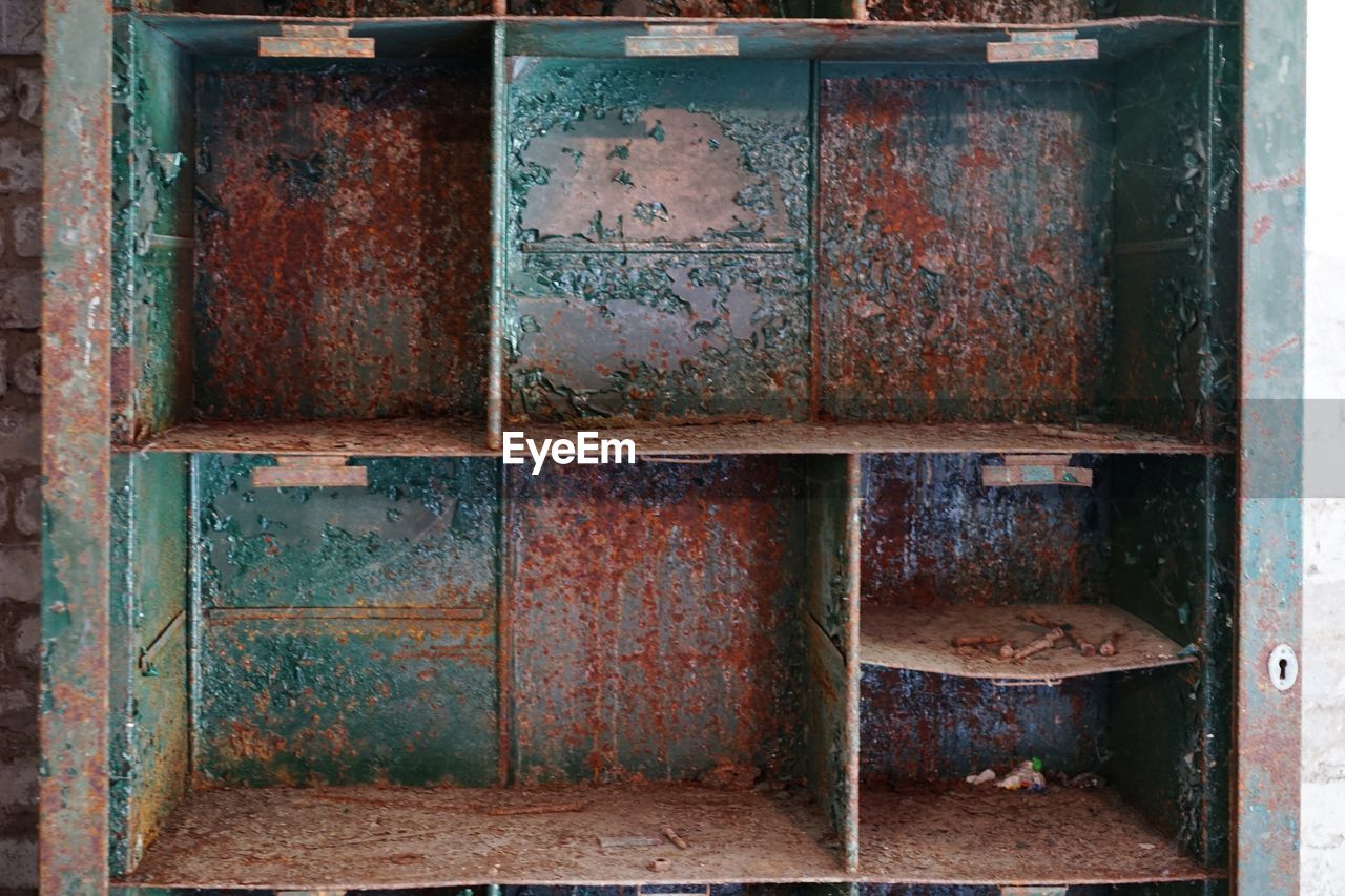 Old rusty metal cupboards and storage lockers