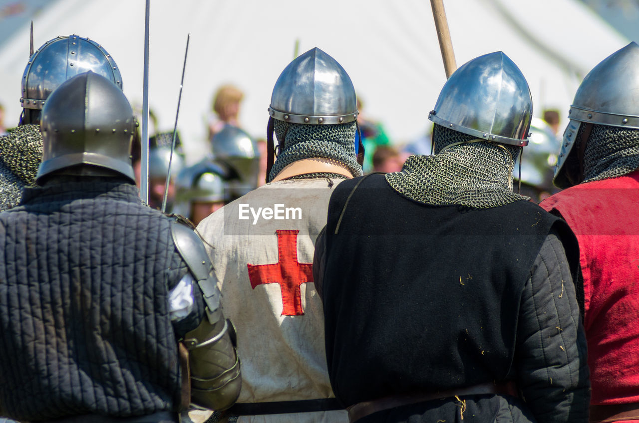 Rear view of men in solider costumes