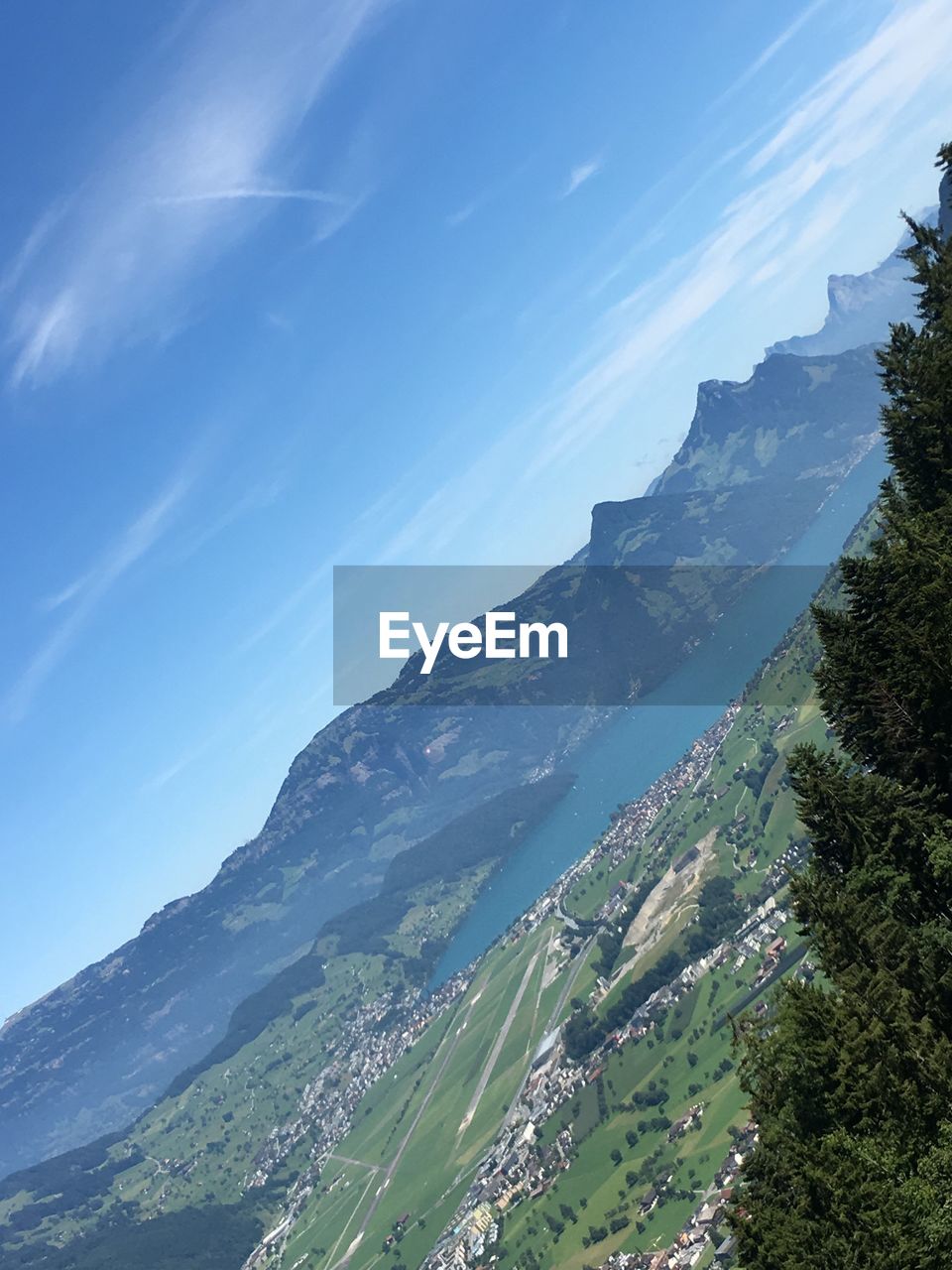 SCENIC VIEW OF LANDSCAPE AND MOUNTAINS AGAINST SKY